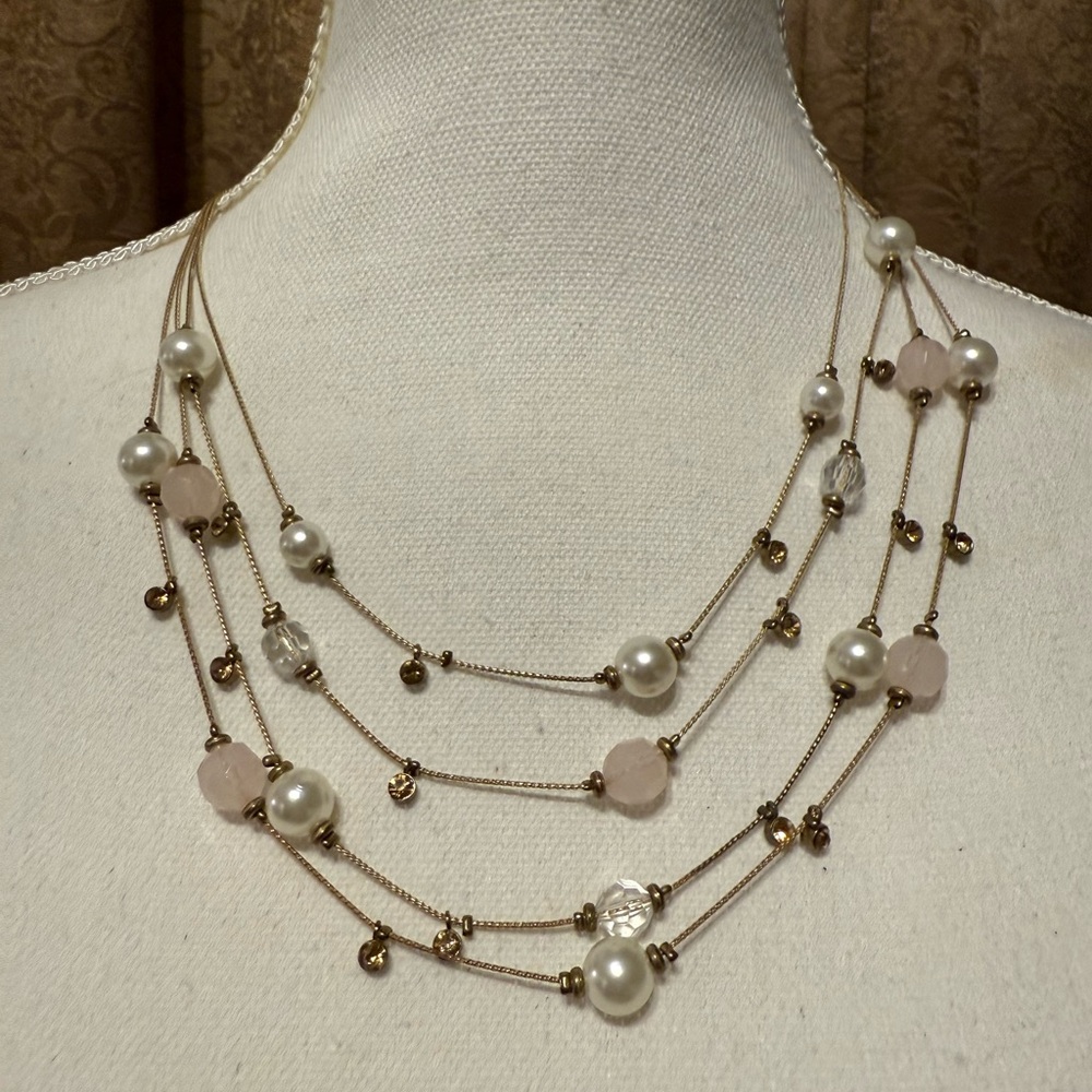 Elegant Gold and Pearl Multi-Strand Necklace